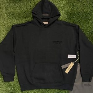 Essentials Black Pullover Hoodie with Subtle Logo
